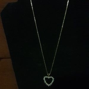 14k solid yellow gold heart  on a 10k gold chain